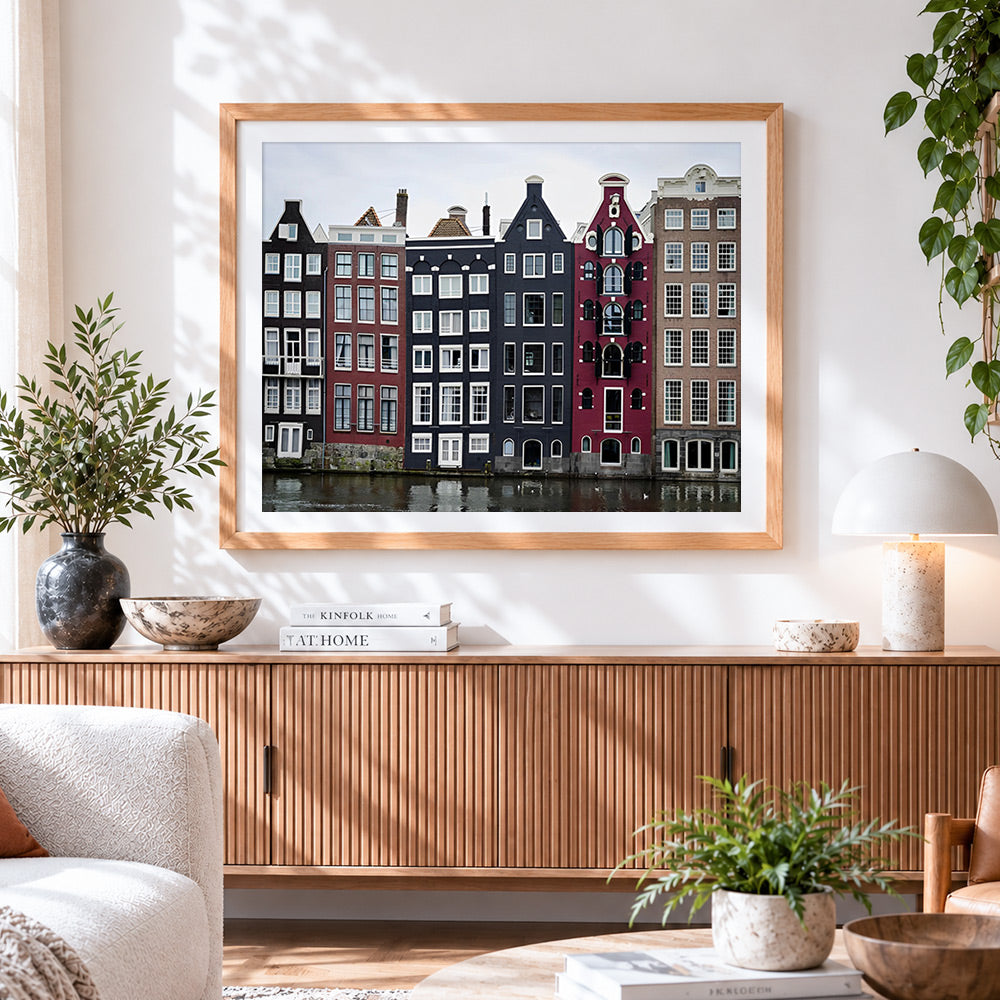 Finished amsterdam canal houses cross stitch artwork displayed