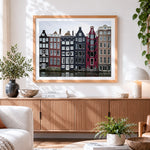 Finished amsterdam canal houses cross stitch artwork displayed