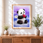 Finished angel panda with a heart paint by numbers artwork displayed as home decor