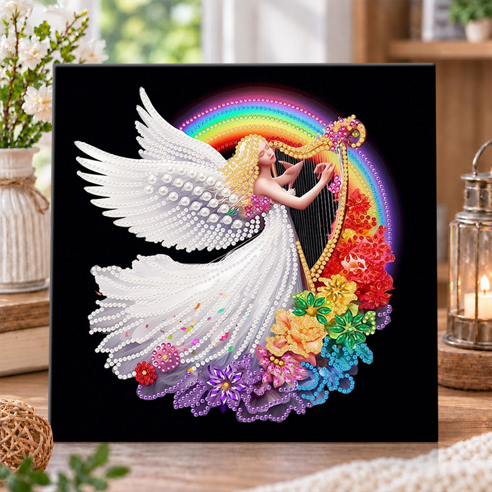Finished angel playing harp pearl diamond painting artwork displayed as holiday home decor