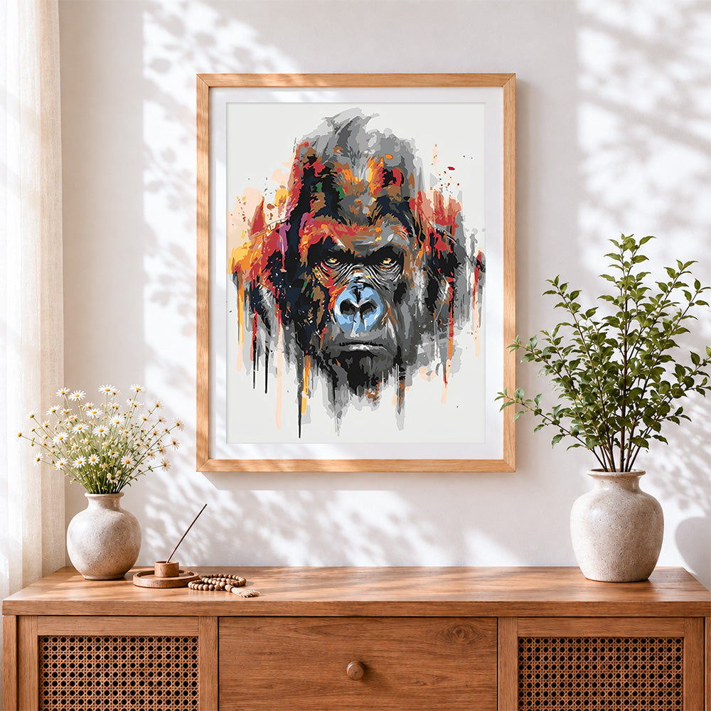 Finished angry colourful splatter gorilla cross stitch artwork displayed
