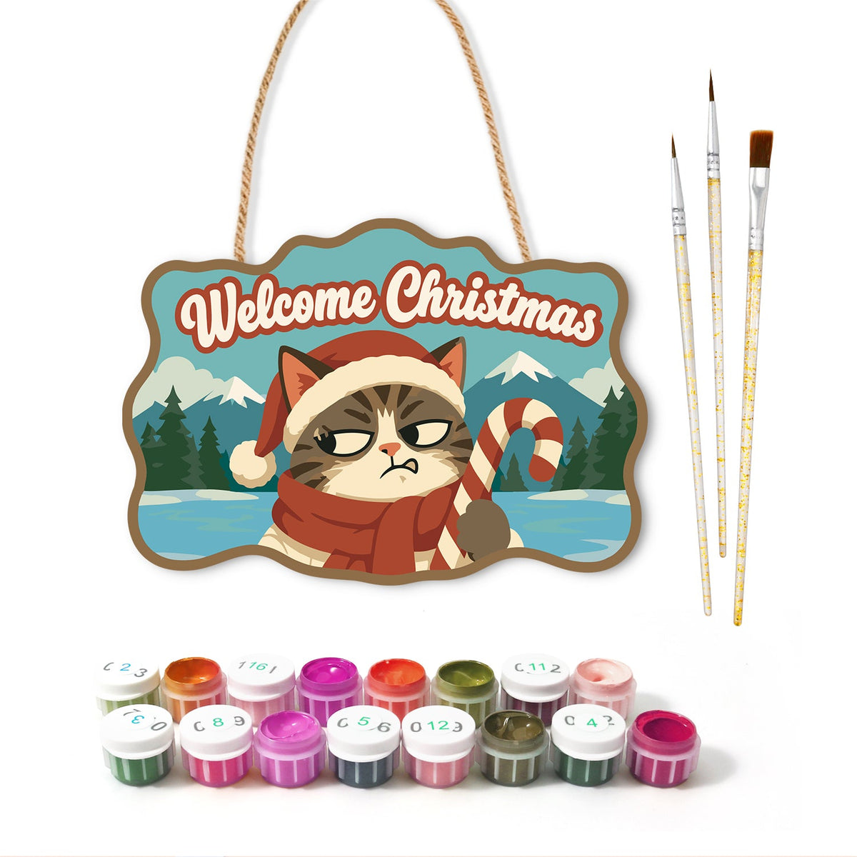 Annoyed cat with candy cane paint by numbers door hanger with paints and brushes
