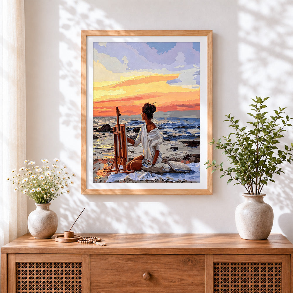 Finished artist painting on beach cross stitch artwork displayed