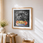As american as apple pie chalkboard print cross stitch artwork displayed on wall as home decor