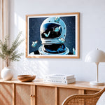 Astronaut helmet with blue butterflies cross stitch artwork displayed on wall as home decor