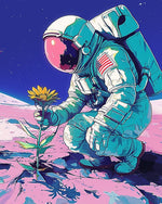 Astronaut holding a sunflower cross stitch kit for beginners