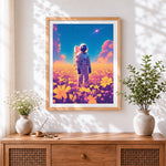 Finished astronaut in a field of flowers cross stitch artwork displayed