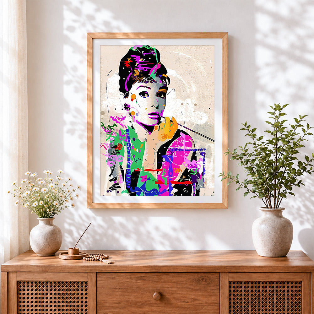 Finished audrey hepburn pop art portrait cross stitch artwork displayed