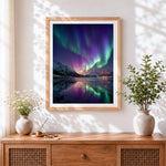 Finished aurora borealis and mountain reflection cross stitch artwork displayed
