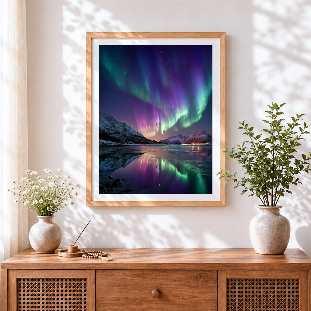 Finished aurora borealis and mountain reflection cross stitch artwork displayed
