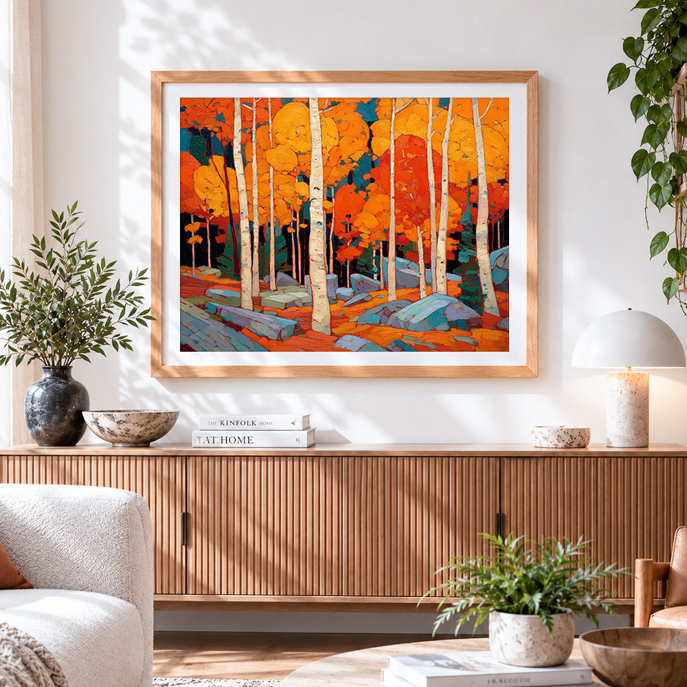 Finished autumn birch forest cross stitch artwork displayed