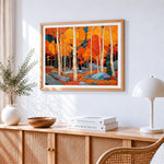 Autumn birch forest cross stitch artwork displayed on wall as home decor