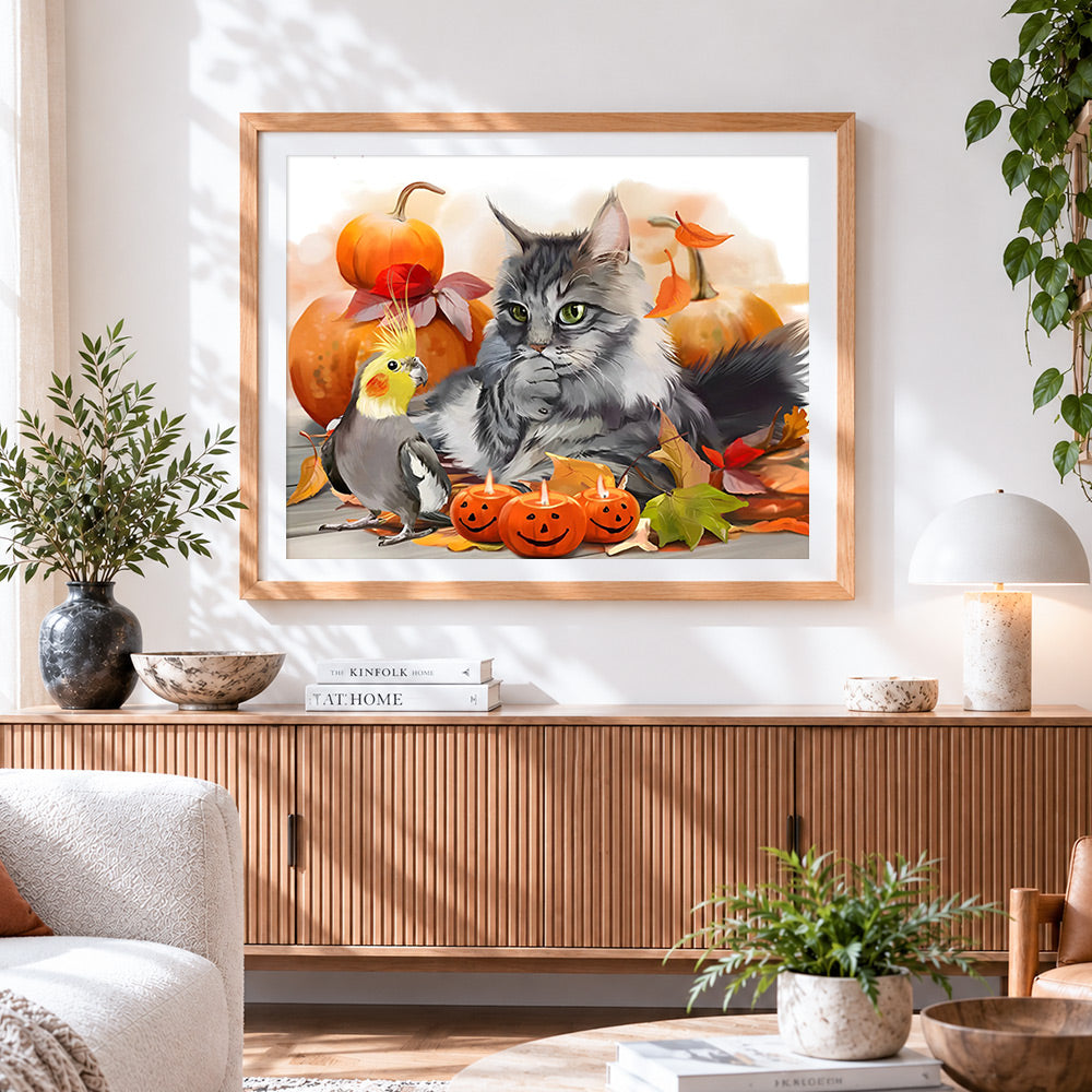 Finished autumn cat cockatiel and pumpkins cross stitch artwork displayed