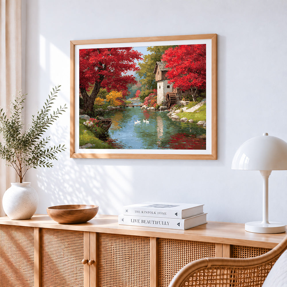 Autumn forest and watermill paint by numbers artwork displayed on wall as home decor