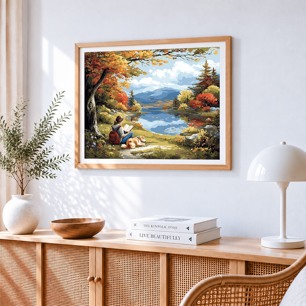 Autumn lakeside reading paint by numbers artwork displayed on wall as home decor