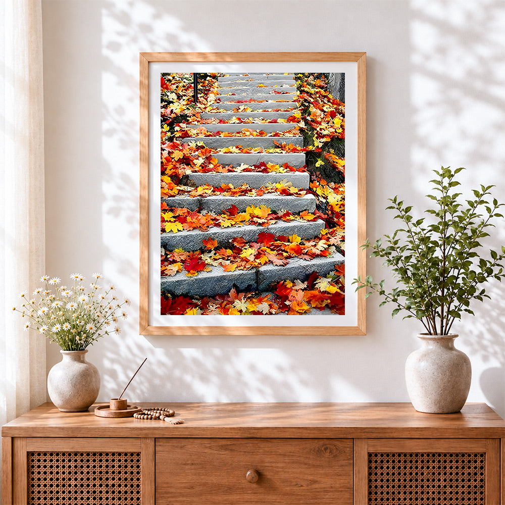 Finished autumn leaves on steps cross stitch artwork displayed