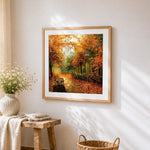Autumn park bench and castle cross stitch artwork displayed on wall as home decor