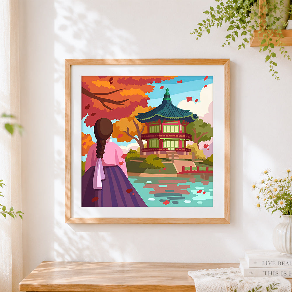 Finished autumn pavilion and woman in hanbok cross stitch artwork displayed