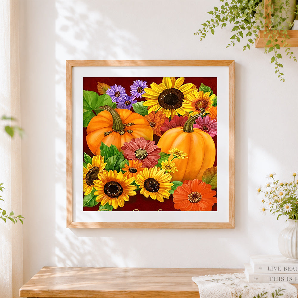 Finished autumn pumpkins and sunflowers pattern cross stitch artwork displayed