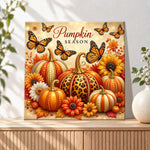 Finished autumn pumpkins with monarch butterflies pearl diamond painting artwork displayed as holiday home decor