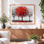 Finished autumn red trees cross stitch artwork displayed