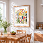 Autumn wildflower meadow cross stitch artwork displayed on wall as home decor