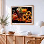 Autumnal pumpkin and sunflower still life cross stitch artwork displayed on wall as home decor