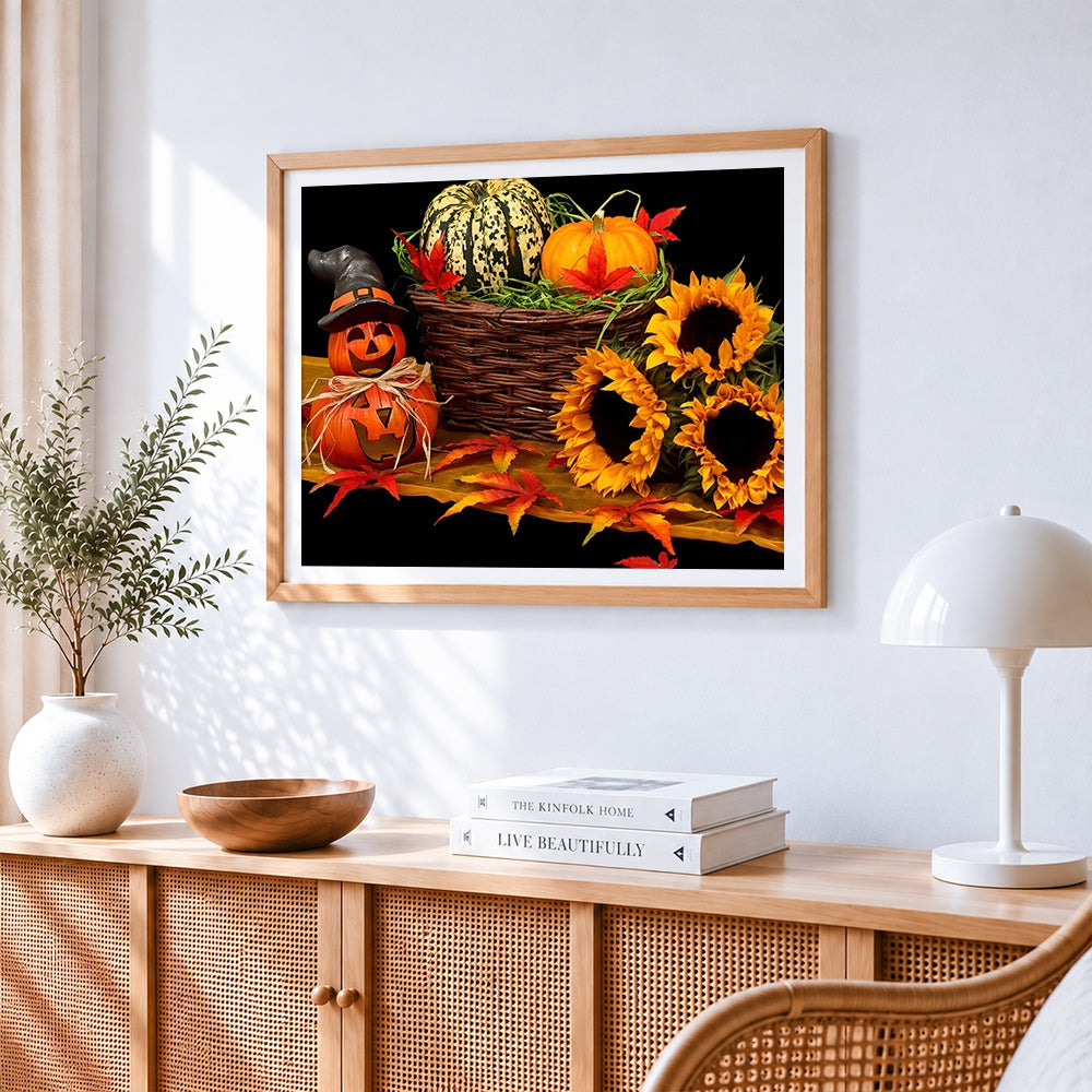 Autumnal pumpkin and sunflower still life cross stitch artwork displayed on wall as home decor