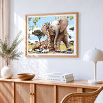 Baby elephant and giraffe paint by numbers artwork displayed on wall as home decor