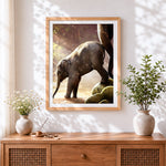 Finished baby elephant with mother cross stitch artwork displayed