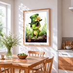 Baby frog with top hat cross stitch artwork displayed on wall as home decor