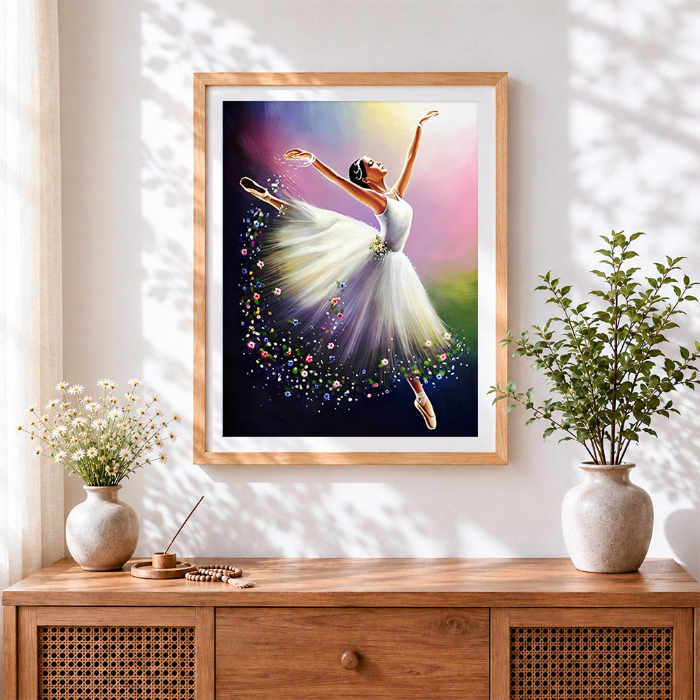 Finished ballet dancer in a white dress cross stitch artwork displayed
