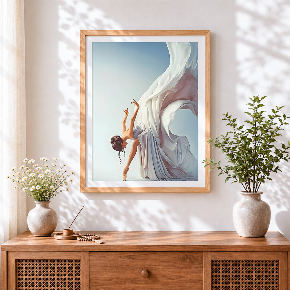 Finished ballet dancer with flowing white dress cross stitch artwork displayed