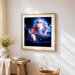 Bare trees under starry galaxy cross stitch artwork displayed on wall as home decor