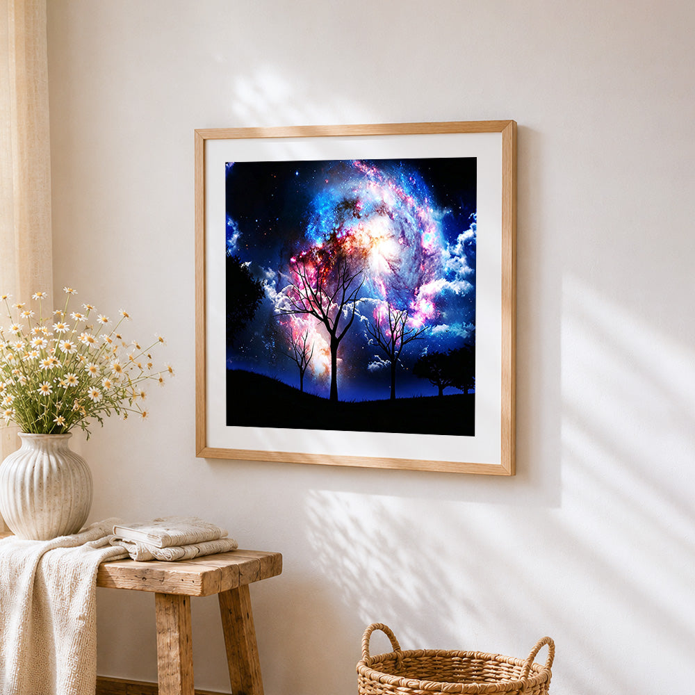Bare trees under starry galaxy cross stitch artwork displayed on wall as home decor
