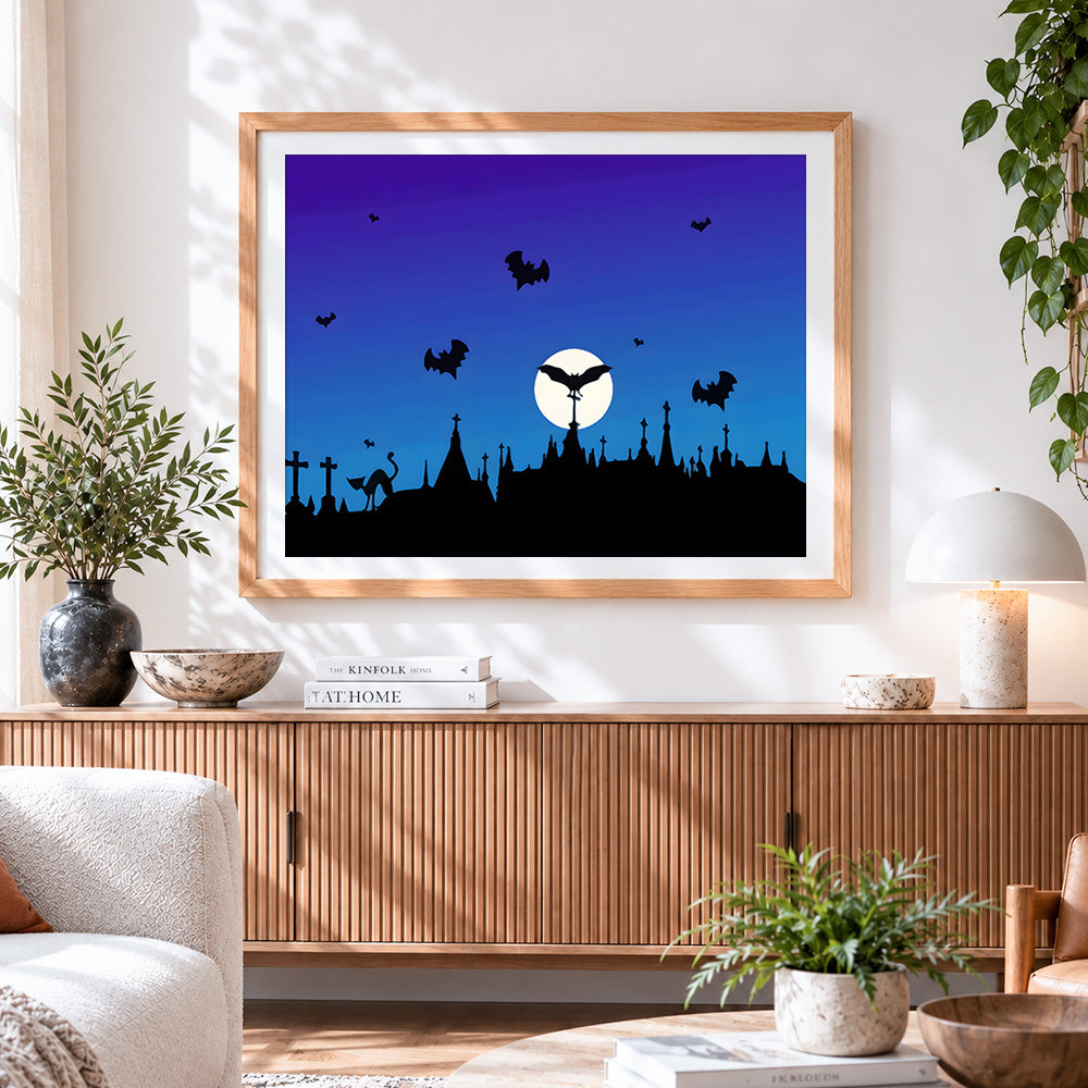 Finished bat silhouettes over a graveyard cross stitch artwork displayed