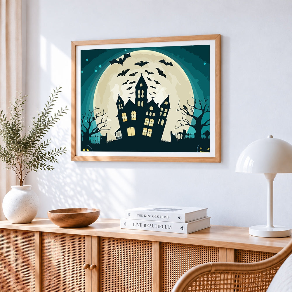 Bats flying over haunted house and full moon paint by numbers artwork displayed on wall as home decor