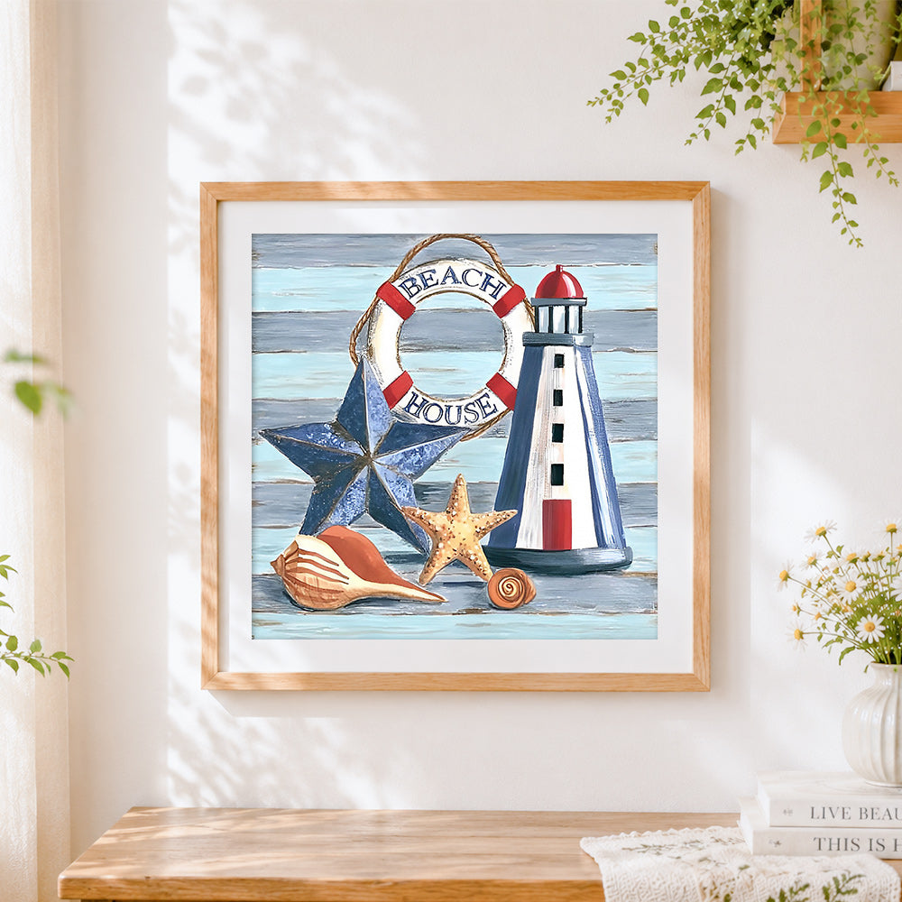 Finished beach house still life cross stitch artwork displayed