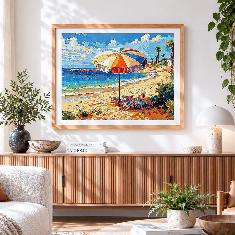 Finished beach parasol and deck chairs cross stitch artwork displayed