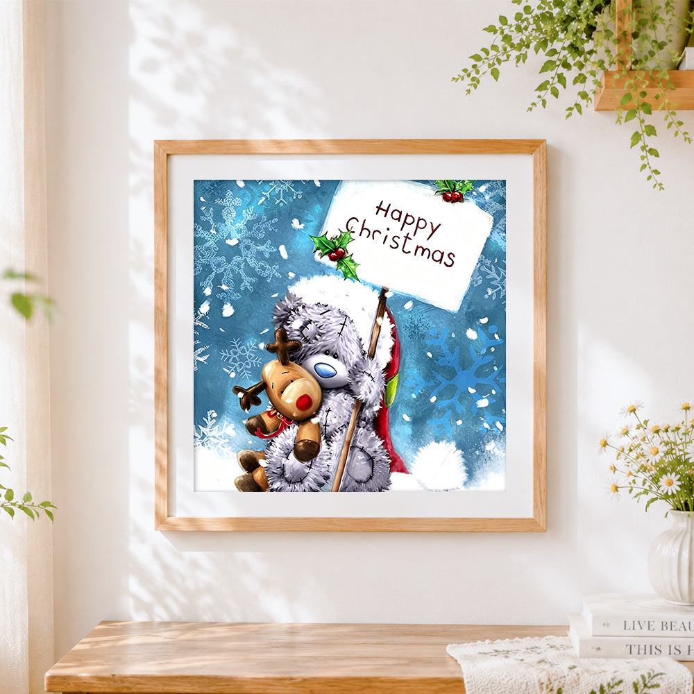 Finished bear and reindeer "happy christmas" cross stitch artwork displayed