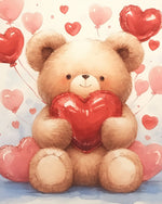 Bear holding a red heart cross stitch kit for beginners