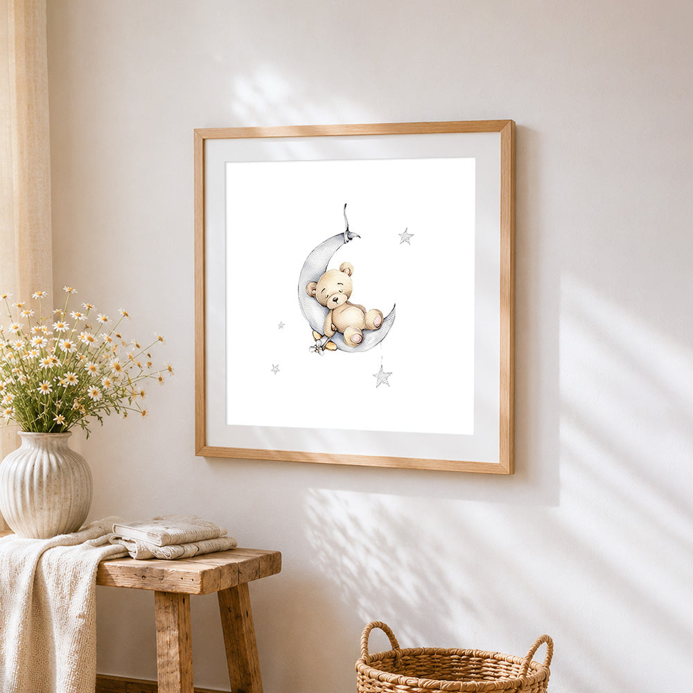 Bear sleeping on the moon cross stitch artwork displayed on wall as home decor