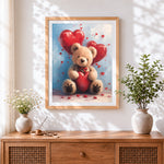 Finished bear with heart balloons cross stitch artwork displayed