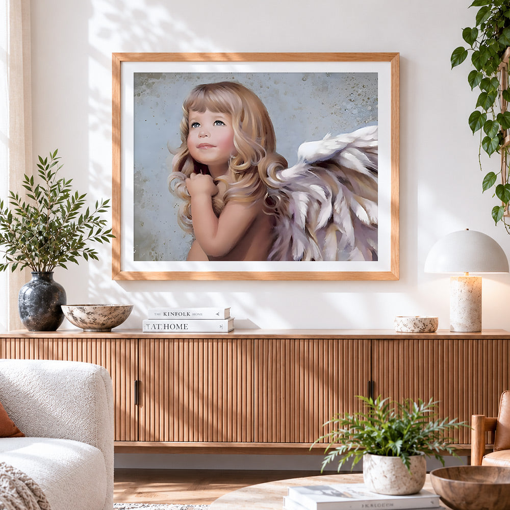 Finished beautiful little angel with white wings cross stitch artwork displayed