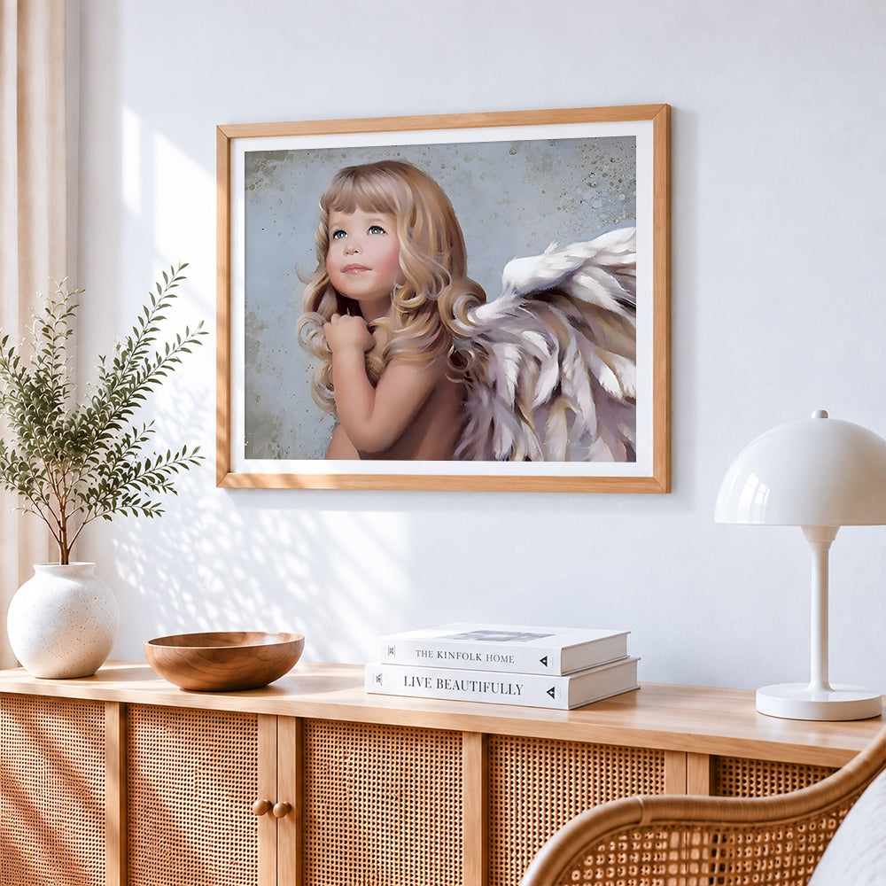 Beautiful little angel with white wings cross stitch artwork displayed on wall as home decor