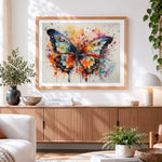 Finished beautiful watercolour butterfly cross stitch artwork displayed