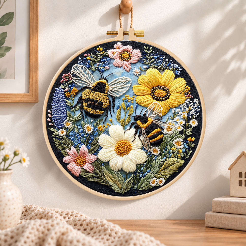 Bees and sunny wildflowers embroidery hoop wall art displayed as warm and cozy handmade home decor