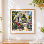 Finished bicycle in the cottage garden cross stitch artwork displayed