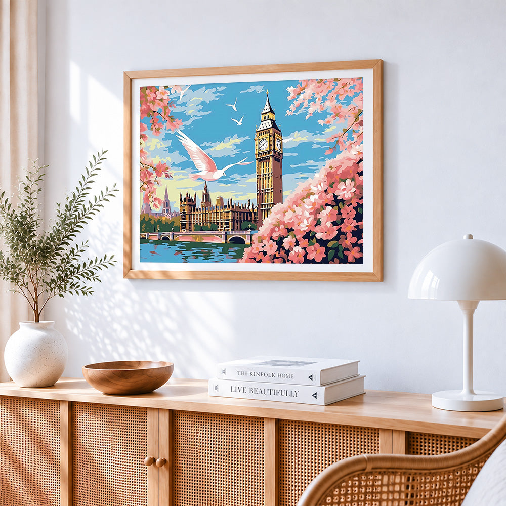 Big ben and cherry blossom cross stitch artwork displayed on wall as home decor