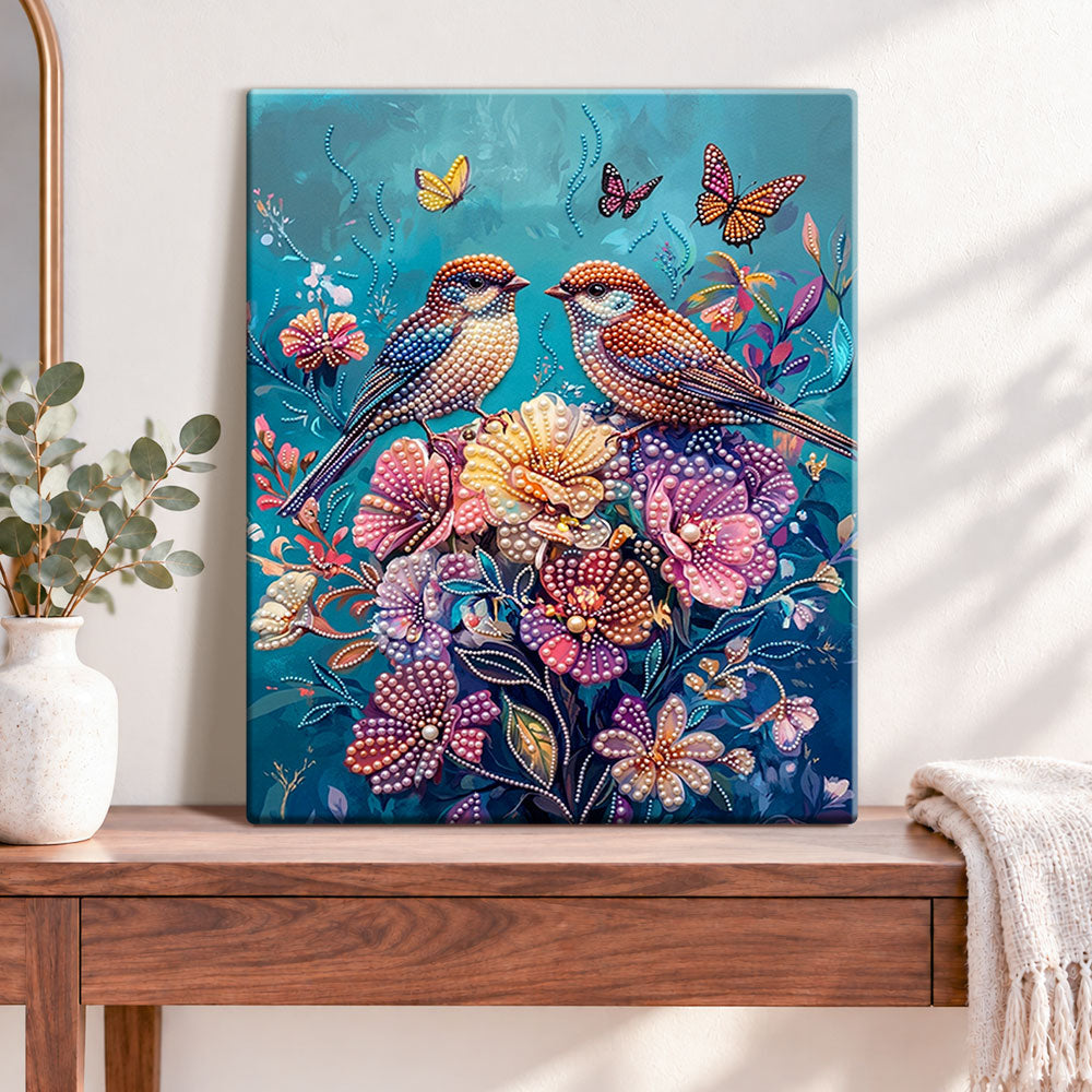 Finished birds and blossoms pearl diamond painting artwork displayed as home decor